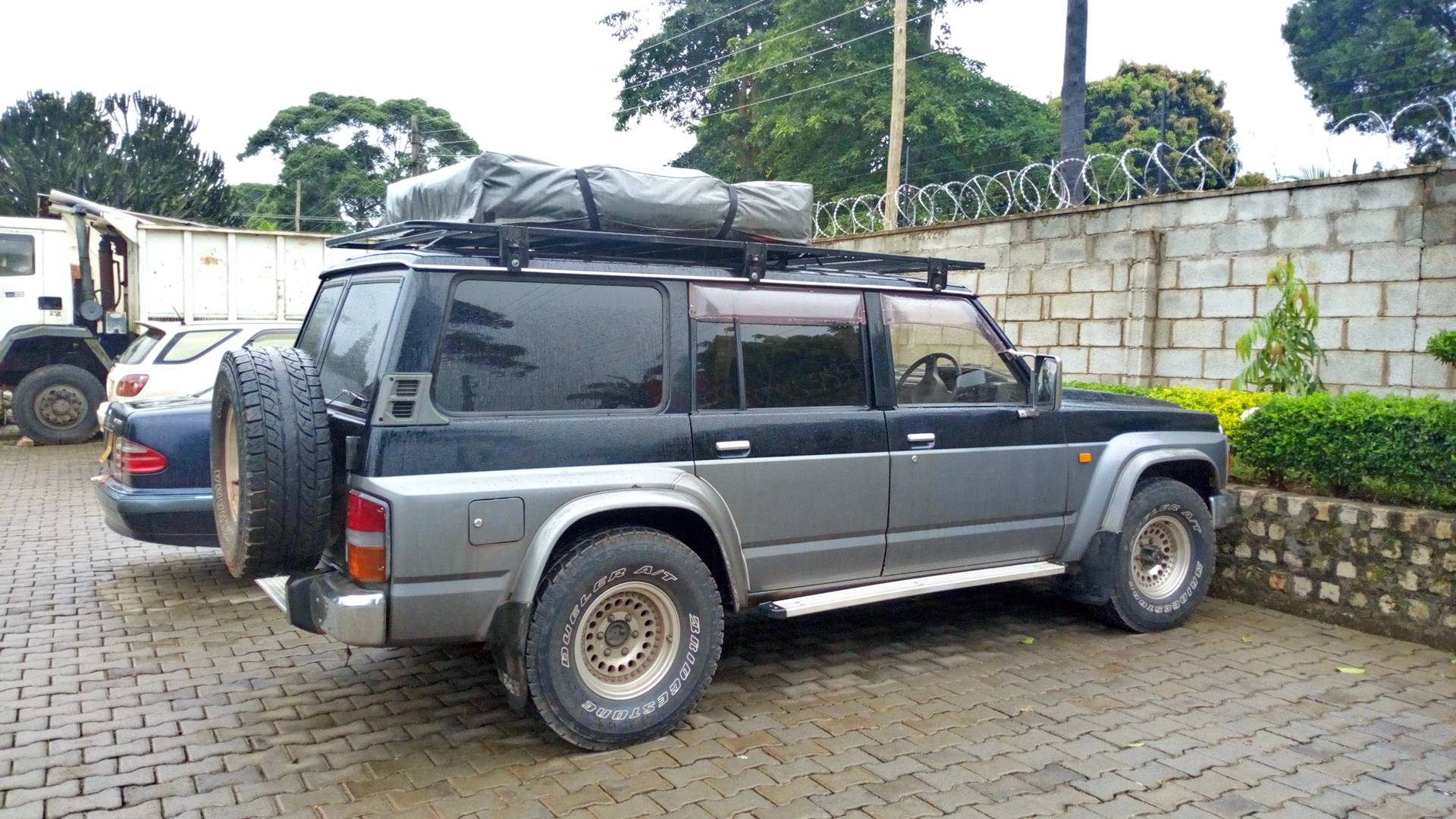 Driver in a 4x4 on a safari trail