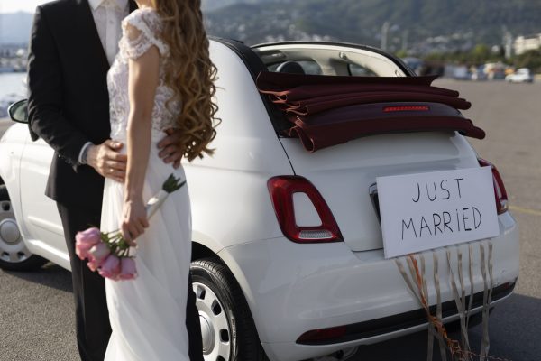 just-married-couple-little-car just-married-couple-little-car